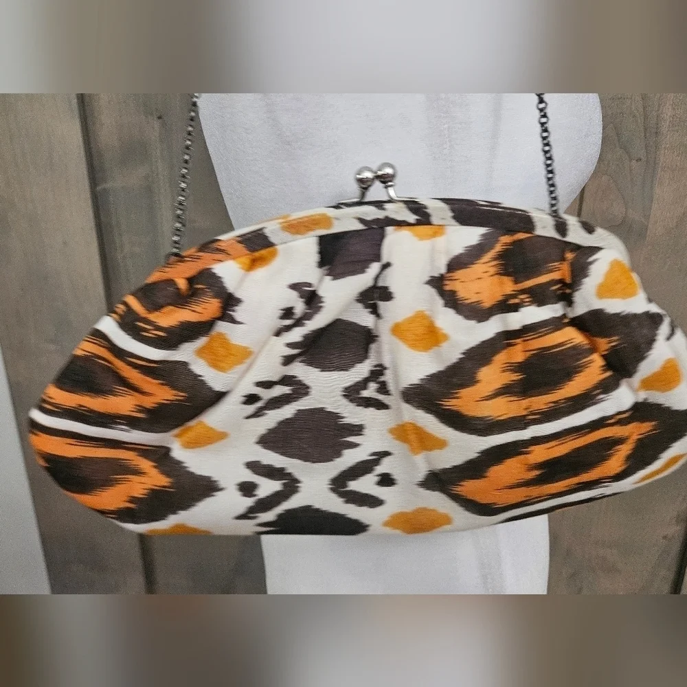 K.C.MALHAN Ikat Printed Woven Cloth Dumpling Chain Bag In Orange/brown Multi.